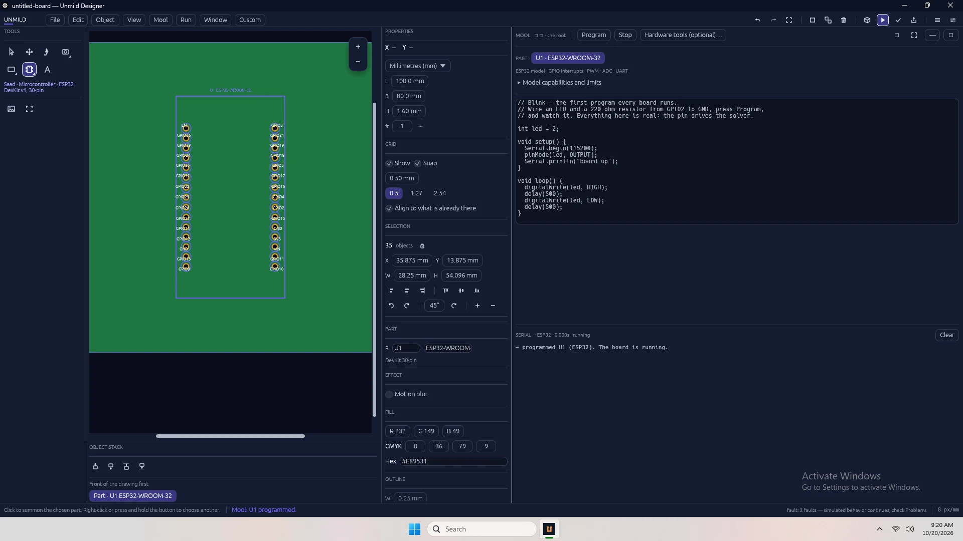Mool's code editor docked next to a board with a placed microcontroller.